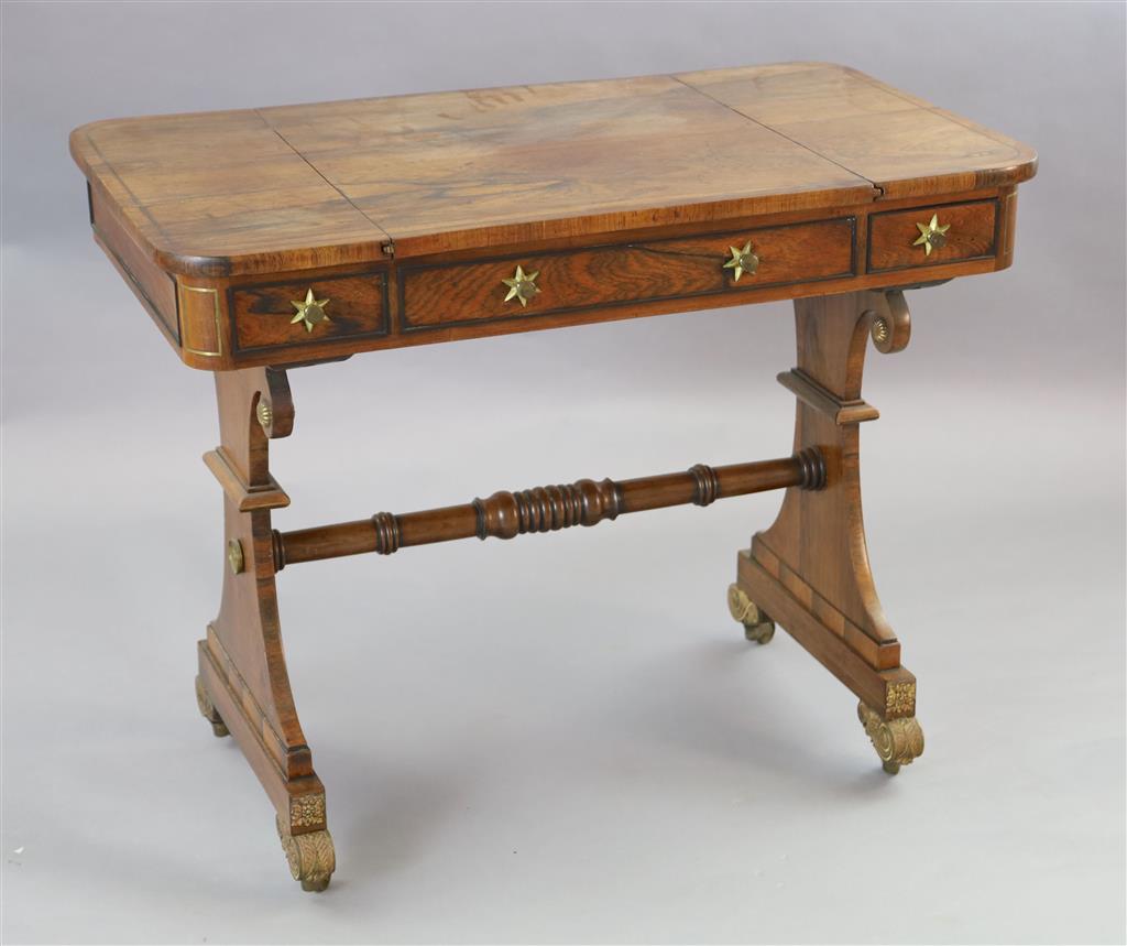 A Regency brass strung rosewood games table, W.3ft D.1ft 9in. H.2ft 5in.